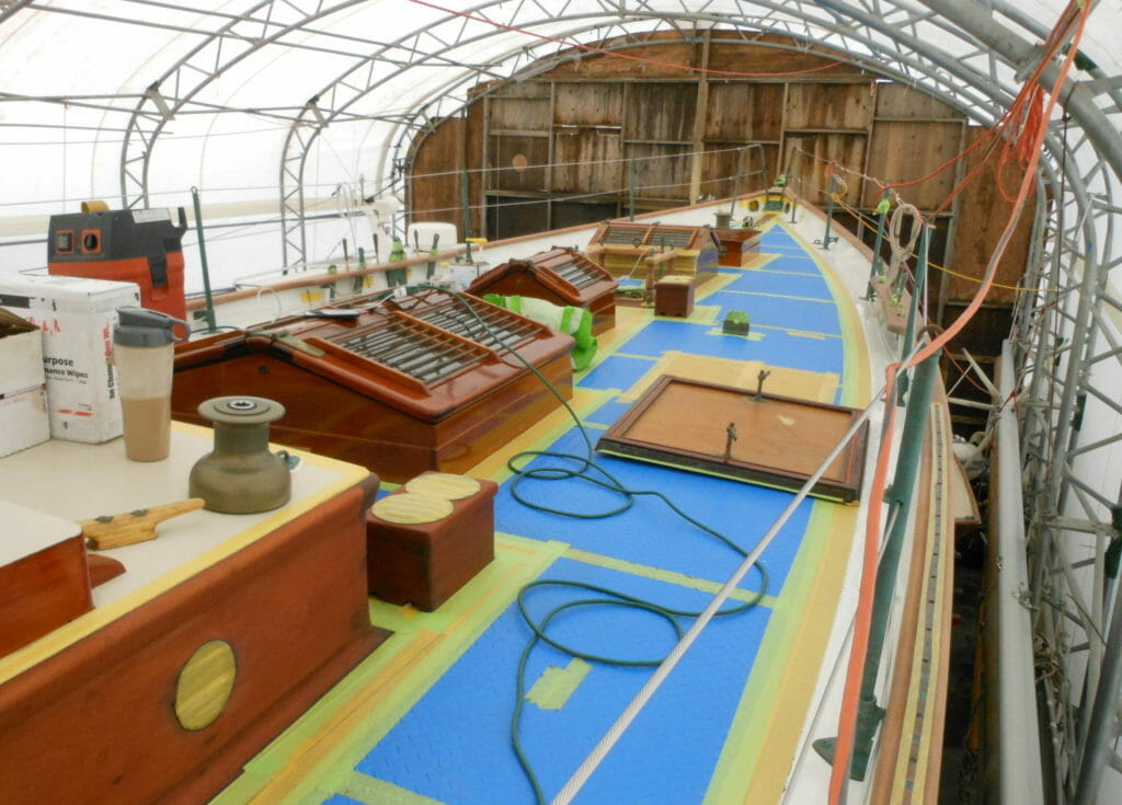Dorade sailboat prepared for varnish